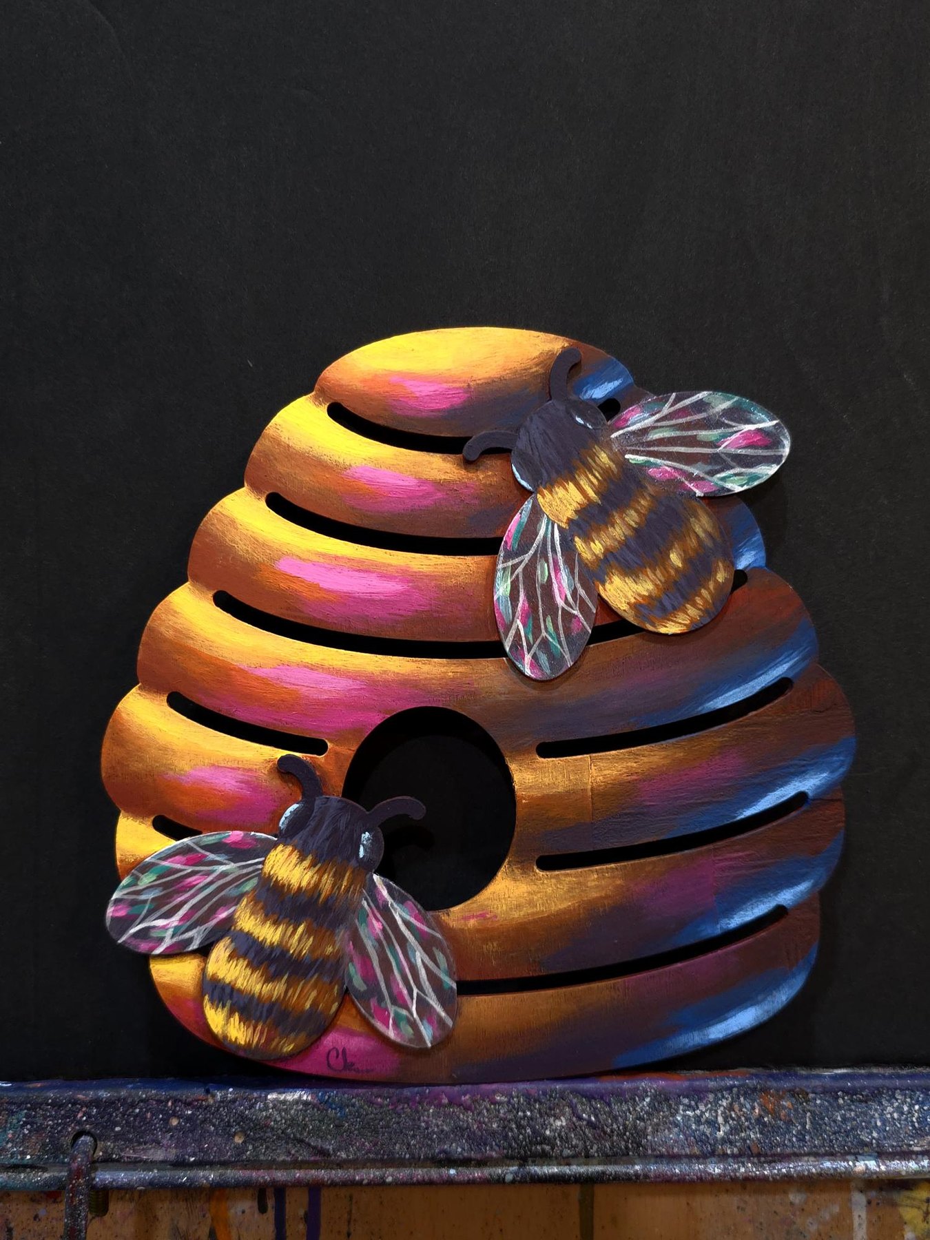 Beehive original with a colorful hive and painted bees